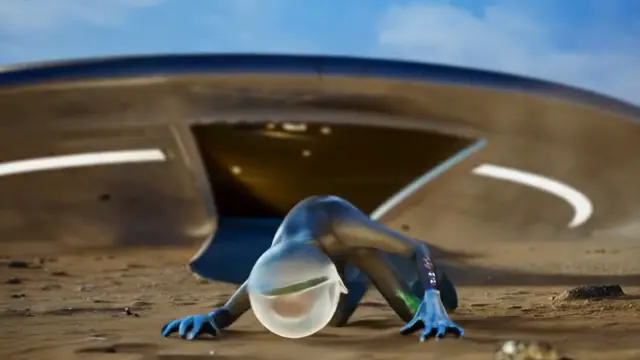 L'extraterrestre blessé s'effondrant au sol après être sorti du vaisseau.